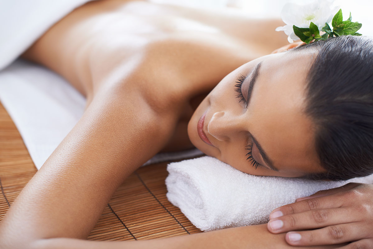 A young woman lying in a health spa